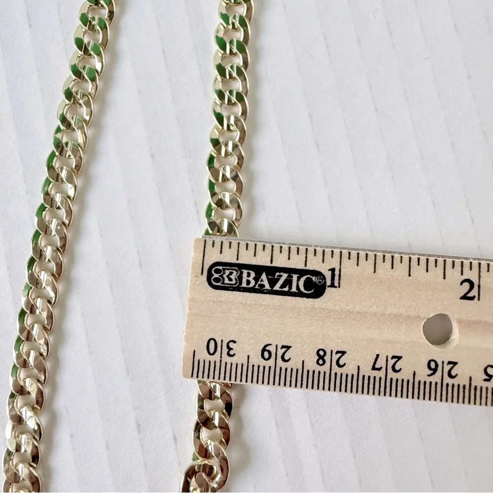 Chain‎ 24”of man with holy death medal. Laminated gold New